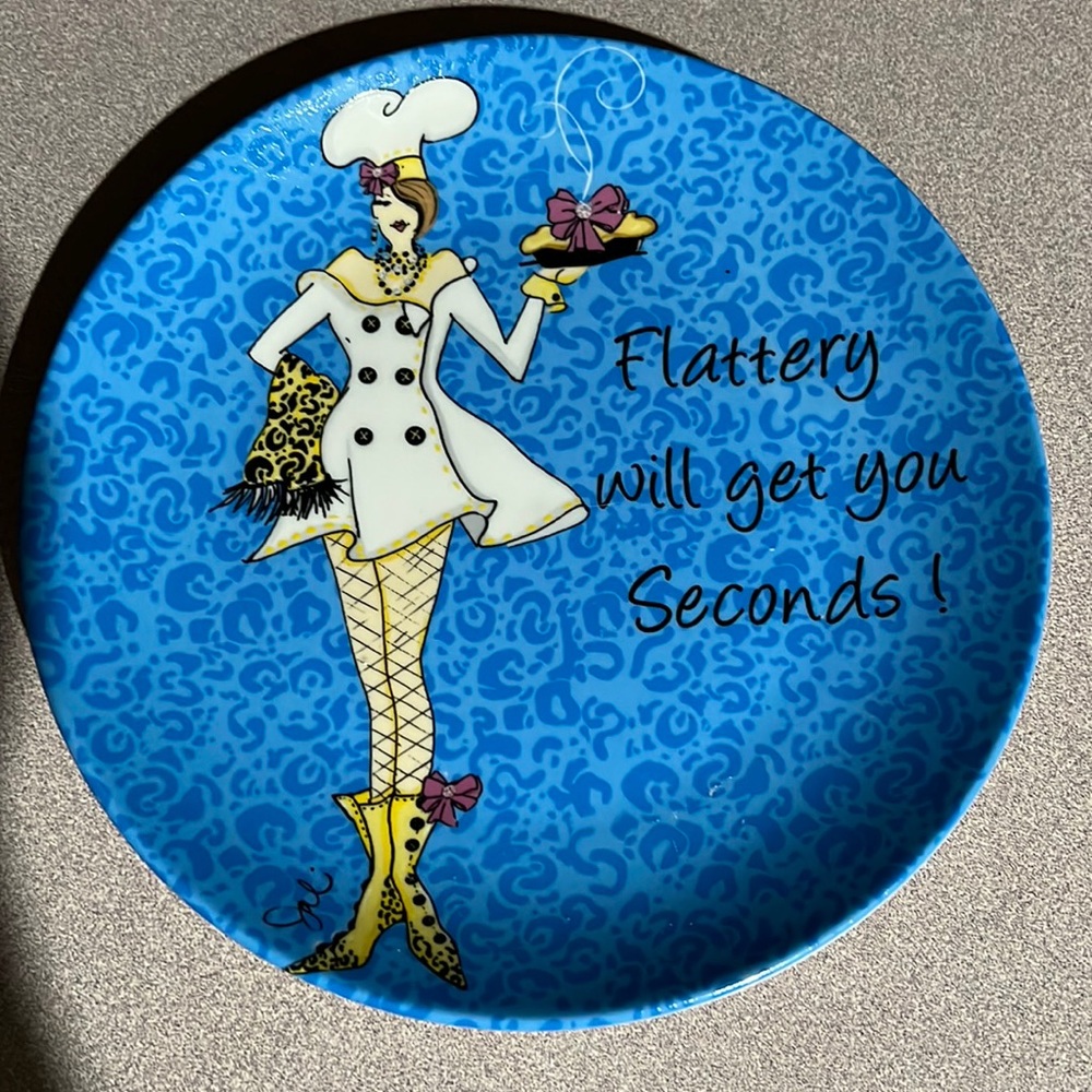 Set of 4 dessert plates by Delish. New without tags